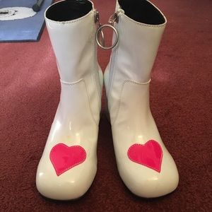 These awesome Unif Moxie Heart boots are brand new